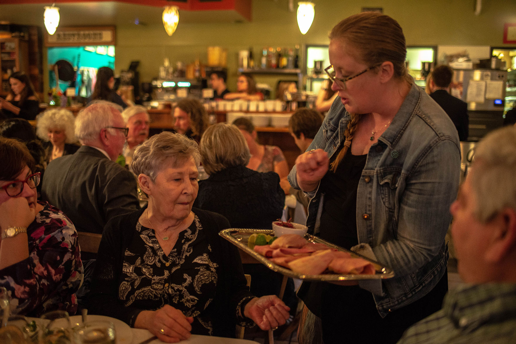 Server passes down food